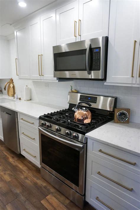 white appliances with stainless handles